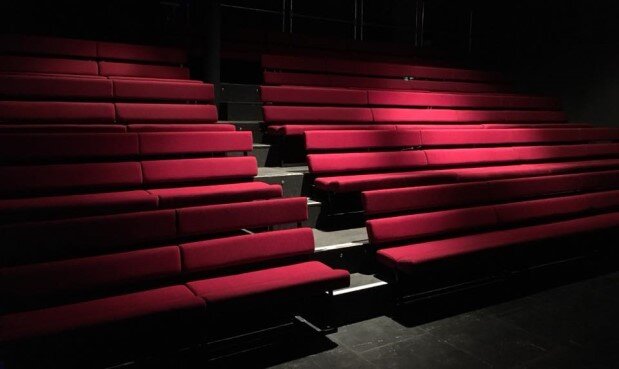 Theatre spot-lit seats
