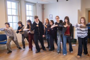 Young actors march forward purposefully