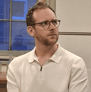 Actor playing Guy in rehearsal