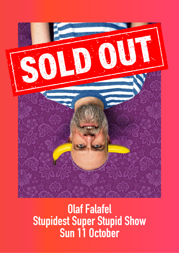 Poster image of an unpside down Olaf Falafel wearing a striped t-shirt and a joke banana on his head.